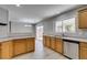 Well-lit kitchen offers ample counter space, backyard view, and access to outdoor area at 11147 Verismo St, Las Vegas, NV 89141