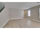 Bright, open-concept living area featuring new light wood-look flooring at 11147 Verismo St, Las Vegas, NV 89141