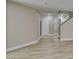 Bright, open-concept living area featuring new light wood-look flooring at 11147 Verismo St, Las Vegas, NV 89141