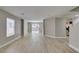Open-concept floor plan featuring light, wood-look floors and abundant natural light at 11147 Verismo St, Las Vegas, NV 89141
