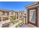 Charming balcony offering serene views of the neighborhood and mountains in the distance at 1197 Mission View Ct, Henderson, NV 89002