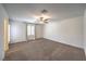 Bedroom with carpet flooring, a ceiling fan, and a window dressed with curtains and blinds at 1197 Mission View Ct, Henderson, NV 89002