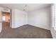 Cozy bedroom with neutral carpet, shuttered window, and convenient access to other rooms at 1197 Mission View Ct, Henderson, NV 89002