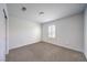Bright bedroom with fresh carpet, window with shutters, and neutral decor for versatile styling at 1197 Mission View Ct, Henderson, NV 89002