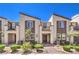 Charming townhome with desert landscaping, private balconies, and convenient front entrances at 1197 Mission View Ct, Henderson, NV 89002