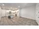 Open floor plan with a kitchen island, stainless appliances, and ample counter space at 1197 Mission View Ct, Henderson, NV 89002