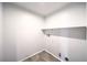 A simple laundry room equipped with a shelf and hookups, ready for your washer and dryer at 1197 Mission View Ct, Henderson, NV 89002