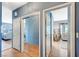 Hallway showcasing the natural light and entryways to several rooms at 1466 Fieldbrook St, Henderson, NV 89052