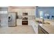 Well-equipped kitchen with stainless steel appliances, granite countertops, and ample cabinet space at 1466 Fieldbrook St, Henderson, NV 89052