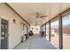 Relaxing covered patio with ceiling fans and outdoor furniture perfect for entertaining at 171 Weeping Willow Ct, Pahrump, NV 89048