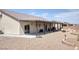 Beautiful backyard featuring a covered patio, providing ample space for outdoor living at 171 Weeping Willow Ct, Pahrump, NV 89048