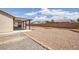Expansive backyard featuring a covered patio, perfect for outdoor gatherings and relaxation at 171 Weeping Willow Ct, Pahrump, NV 89048