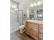 Clean bathroom with a glass shower, tile floors, and modern vanity at 171 Weeping Willow Ct, Pahrump, NV 89048