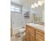 Bright bathroom featuring a shower and tub combo, vanity with granite countertop, and stylish mirror at 171 Weeping Willow Ct, Pahrump, NV 89048