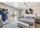 Bright bedroom with backyard access, featuring a comfy bed and stylish decor, inviting a peaceful retreat at 171 Weeping Willow Ct, Pahrump, NV 89048