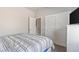 Bright bedroom with a closet, bed, and modern furniture at 171 Weeping Willow Ct, Pahrump, NV 89048