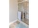 Modern tiled shower stall with sleek glass doors, designed for a refreshing and contemporary bathing experience at 171 Weeping Willow Ct, Pahrump, NV 89048