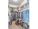 Organized walk-in closet with shelving and hanging space, offering ample storage for clothes, shoes, and accessories at 171 Weeping Willow Ct, Pahrump, NV 89048
