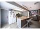 Bright and modern kitchen with island, updated appliances, and stylish backsplash at 1843 Mimosa Ct, Henderson, NV 89014