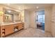 Elegant bathroom boasts double sinks, vanity, and ensuite access to the bedroom at 2000 Fashion Show Dr # 4105-4106, Las Vegas, NV 89109