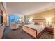 Spacious suite combining bedroom and living spaces with luxurious furnishings and stunning cityscape backdrop at 2000 Fashion Show Dr # 4105-4106, Las Vegas, NV 89109