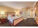Bedroom featuring a plush bed, bedside table and natural light at 2000 Fashion Show Dr # 4105-4106, Las Vegas, NV 89109