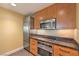 A close up of stainless steel appliances including a refrigerator, microwave, oven and cooktop at 2000 Fashion Show Dr # 4105-4106, Las Vegas, NV 89109