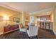 This living area features a table with chairs, a credenza and access to the kitchen at 2000 Fashion Show Dr # 4105-4106, Las Vegas, NV 89109