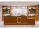 Elegant lobby with a sleek reception desk and stylish display shelves at 2000 Fashion Show Dr # 4105-4106, Las Vegas, NV 89109
