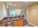 Condo kitchen with a breakfast bar that opens to a living area with lots of natural light at 2000 Fashion Show Dr # 4106, Las Vegas, NV 89109