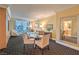 Stylish living room with cityscape view featuring a dining area and built in cabinets at 2000 Fashion Show Dr # 4106, Las Vegas, NV 89109