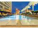 This resort-style pool offers a relaxing environment with palm trees and city views at 2000 Fashion Show Dr # 4106, Las Vegas, NV 89109
