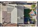 A bird's eye view of a well-maintained property, with a tidy roof, backyard pool, and patio at 2088 Miner Way, Las Vegas, NV 89104