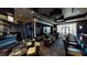 Stylish resident bar and lounge area with comfortable seating, a long bar, and ample lighting at 211 E Flamingo Rd # 202, Las Vegas, NV 89169