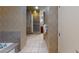 Spacious bathroom with walk-in shower and tiled flooring at 211 E Flamingo Rd # 202, Las Vegas, NV 89169