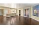 Spacious living room showcasing a modern kitchen, stylish bar, and expansive city views at 222 Karen Ave # 1702, Las Vegas, NV 89109