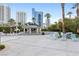 Relaxing outdoor area with covered seating, lounge chairs, and scenic views of the city at 222 Karen Ave # 1702, Las Vegas, NV 89109
