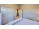 Bedroom featuring closet, queen bed and access to second door at 2325 Windmill Pkwy # 1622, Henderson, NV 89074
