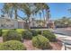 Community entrance with lush landscaping and signage at 2325 Windmill Pkwy # 1622, Henderson, NV 89074