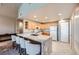 Kitchen with granite countertops, stainless steel appliances, breakfast bar, and modern finishes at 2325 Windmill Pkwy # 1622, Henderson, NV 89074