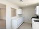 This kitchen features white cabinets, stainless steel appliances, and plenty of counter space at 236 Pershing Dr, Las Vegas, NV 89107