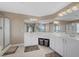 Bright bathroom features double sinks, vanity, tiled floor, and glass enclosed shower at 249 Cinnamon Ridge Way, Henderson, NV 89015