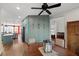 Dining room with modern cabinets, bright light, and open to the kitchen at 249 Cinnamon Ridge Way, Henderson, NV 89015