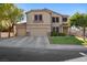Charming two-story home featuring a three-car garage and well-manicured front lawn at 249 Cinnamon Ridge Way, Henderson, NV 89015