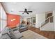 Comfortable living room with an open floor plan and a ceiling fan at 249 Cinnamon Ridge Way, Henderson, NV 89015