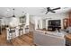 Open living space with kitchen island, modern cabinets, and comfortable seating at 249 Cinnamon Ridge Way, Henderson, NV 89015