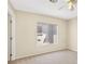 Neutral bedroom with carpet, natural lighting, and sliding glass door at 2558 Lazy Saddle Dr, Henderson, NV 89002