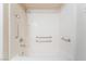 Bright bathroom features a tub and shower combo with grab bars and sleek fixtures at 2615 W Gary Ave # 1053, Las Vegas, NV 89123
