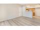 Open floor plan with stylish flooring and a partial view of the kitchen area at 2615 W Gary Ave # 1053, Las Vegas, NV 89123