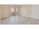 Inviting room with pristine flooring and a sliding glass door, offering seamless indoor-outdoor living at 2615 W Gary Ave # 1053, Las Vegas, NV 89123